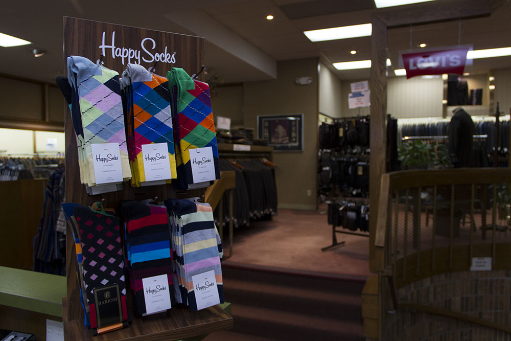 Happy Socks display on the counter of a clothing store