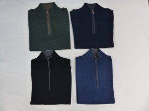 Quarter-zip sweatshirts in assorted colors laid out on flat surface