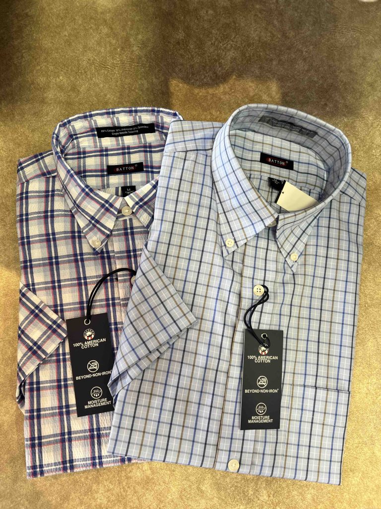 Two white plaid button-up shirts